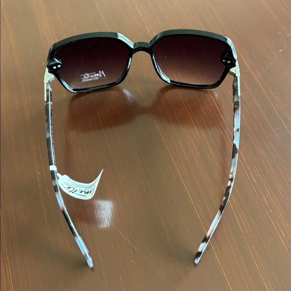 Nanette Lepore 100% UV protect,black frame,tortoise arms,black lens sunglasses